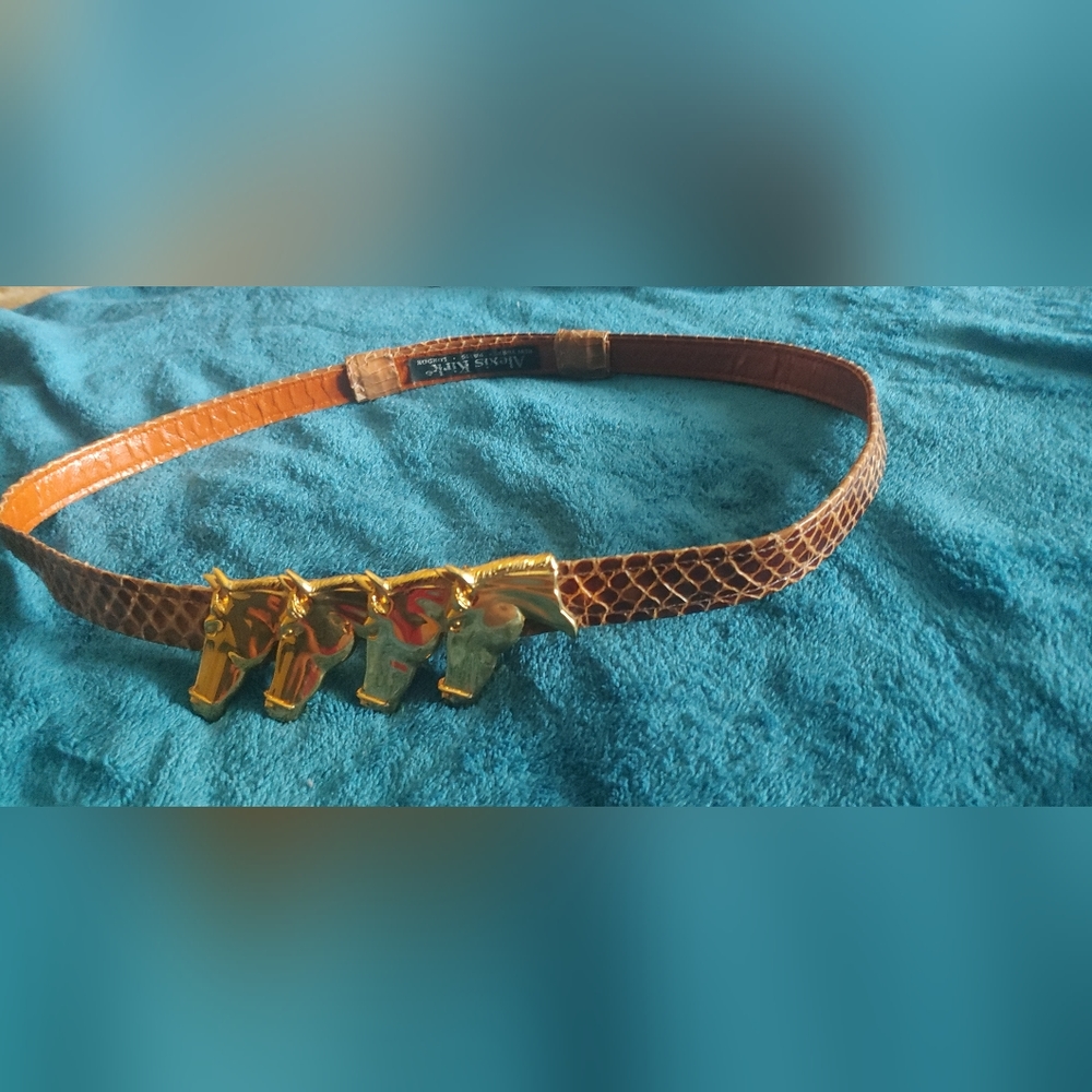 Vintage Alexis Kirk belt with 4 horses accessory. Reptile skin